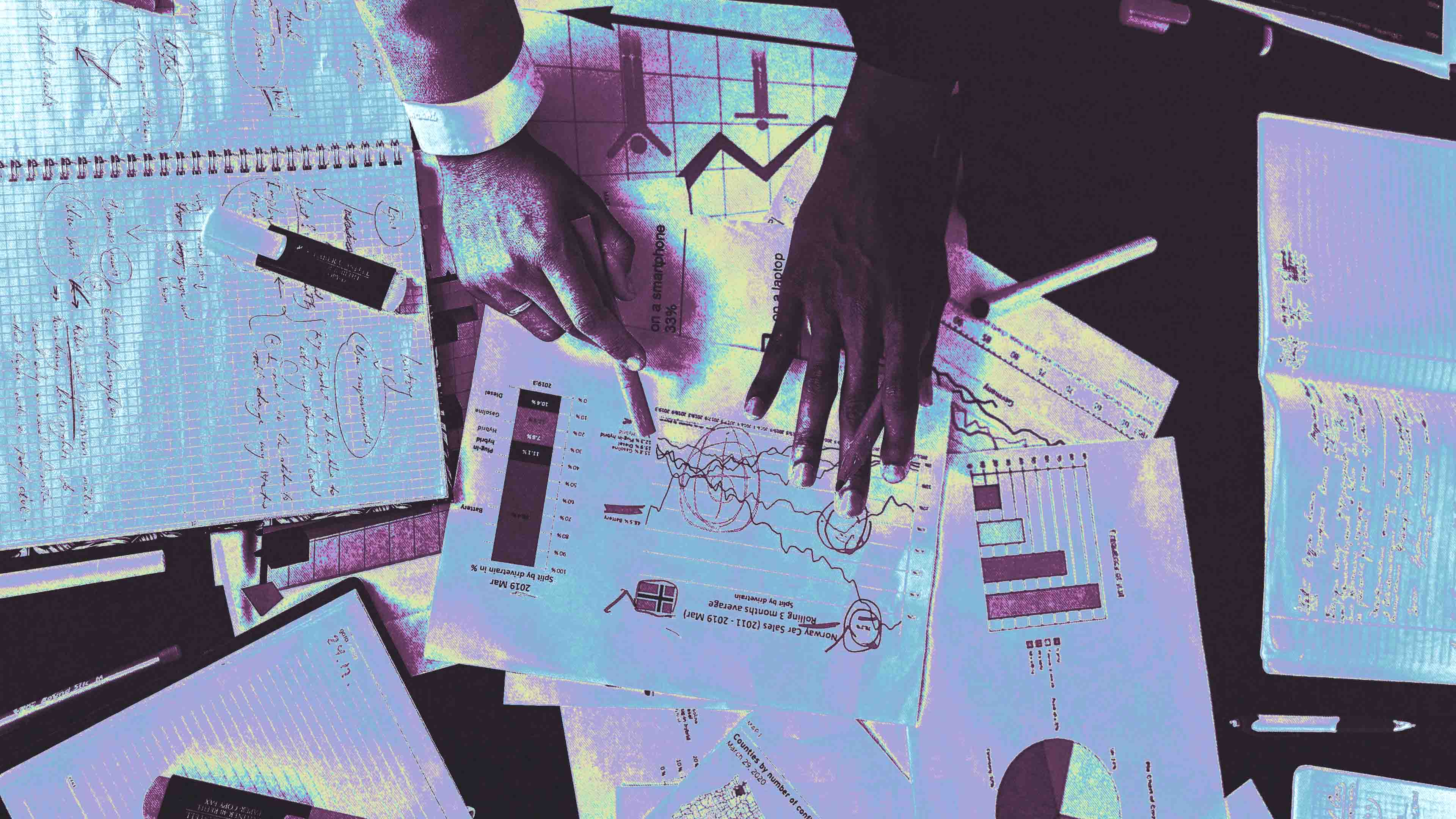 Two hands exploring a pile of paperwork on a desk. The image has been highly stylized to appear toxic.